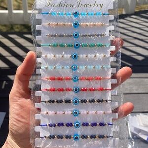 Set of 12 Adjustable anklets.  NWT.. handmade.